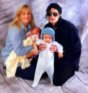 Debbie Rowe with her late husband Michael Jackson and children